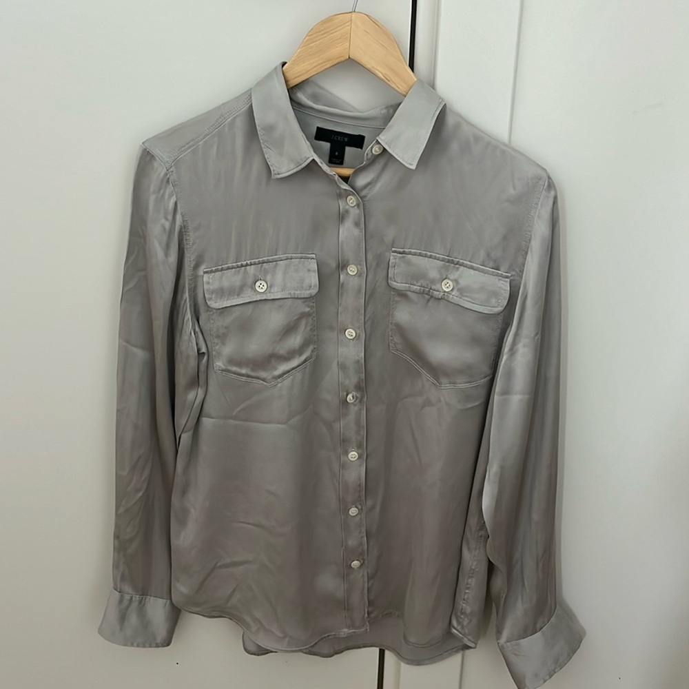 Jcrew button-down silver blouse.